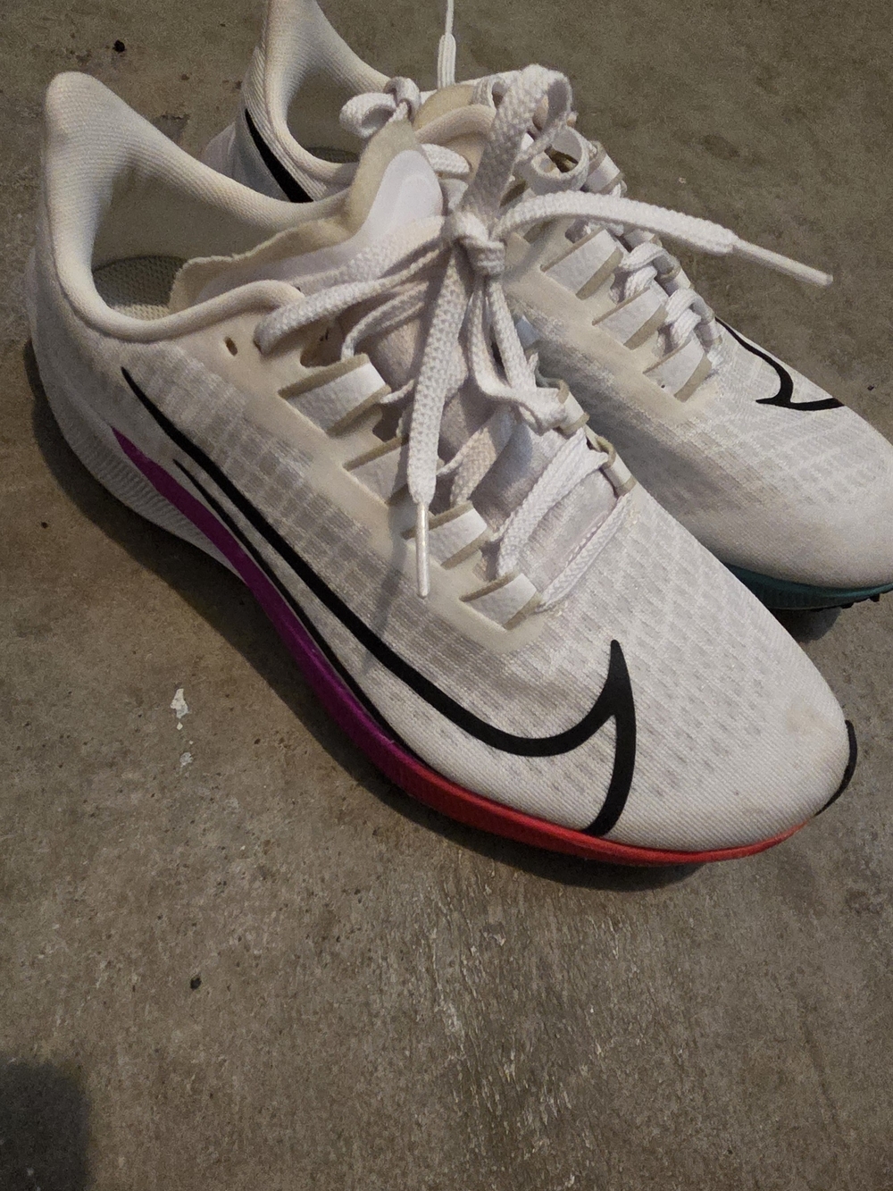 Nike White Running Shoes with Pink Accent